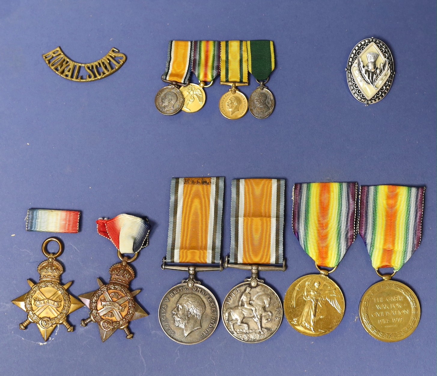 Two WWI family medal trios to 9098 Pte. A Paterson 2/R Scots. including Mons star and to 11619 Pte. A Paterson S. Gds. with miniature medals etc.